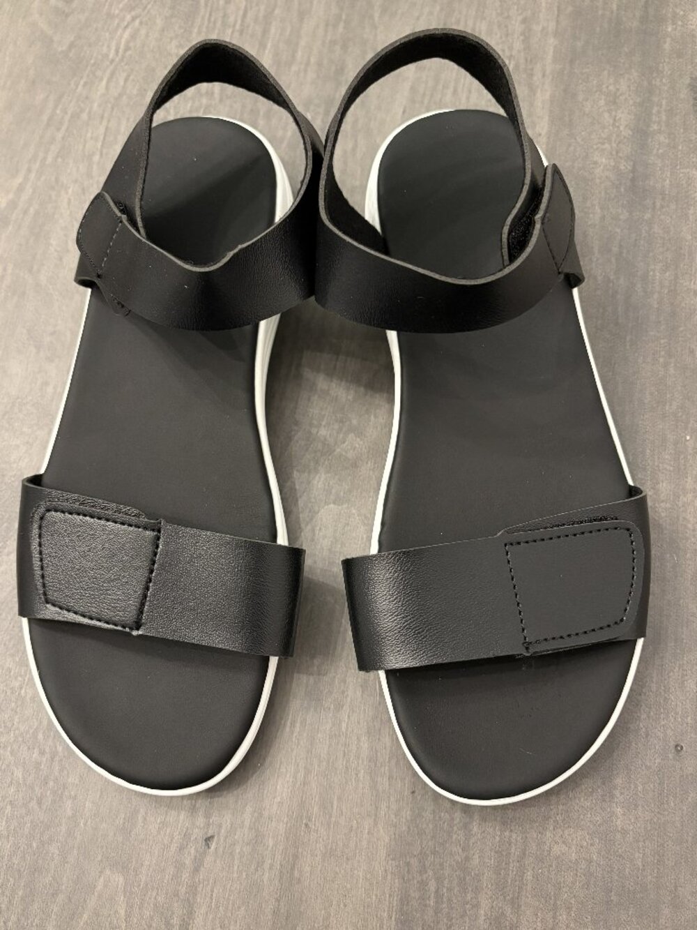 Women's Black sandals.  Adjustable with hook and loop closure.  Size 7.5 NEW